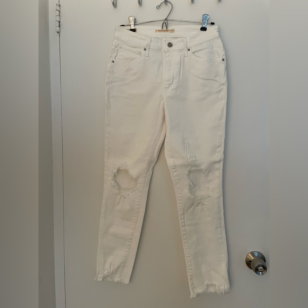 Levi’s white ripped skinny jeans